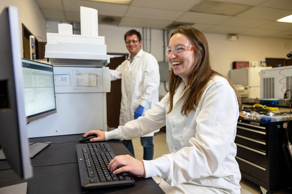 an ellipse analytics employee reviewing chemical testing results